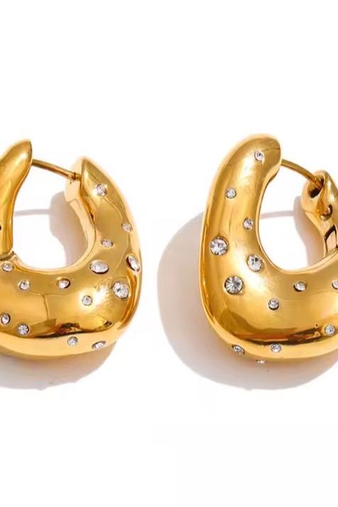 Gold hoop w/ diamond details.